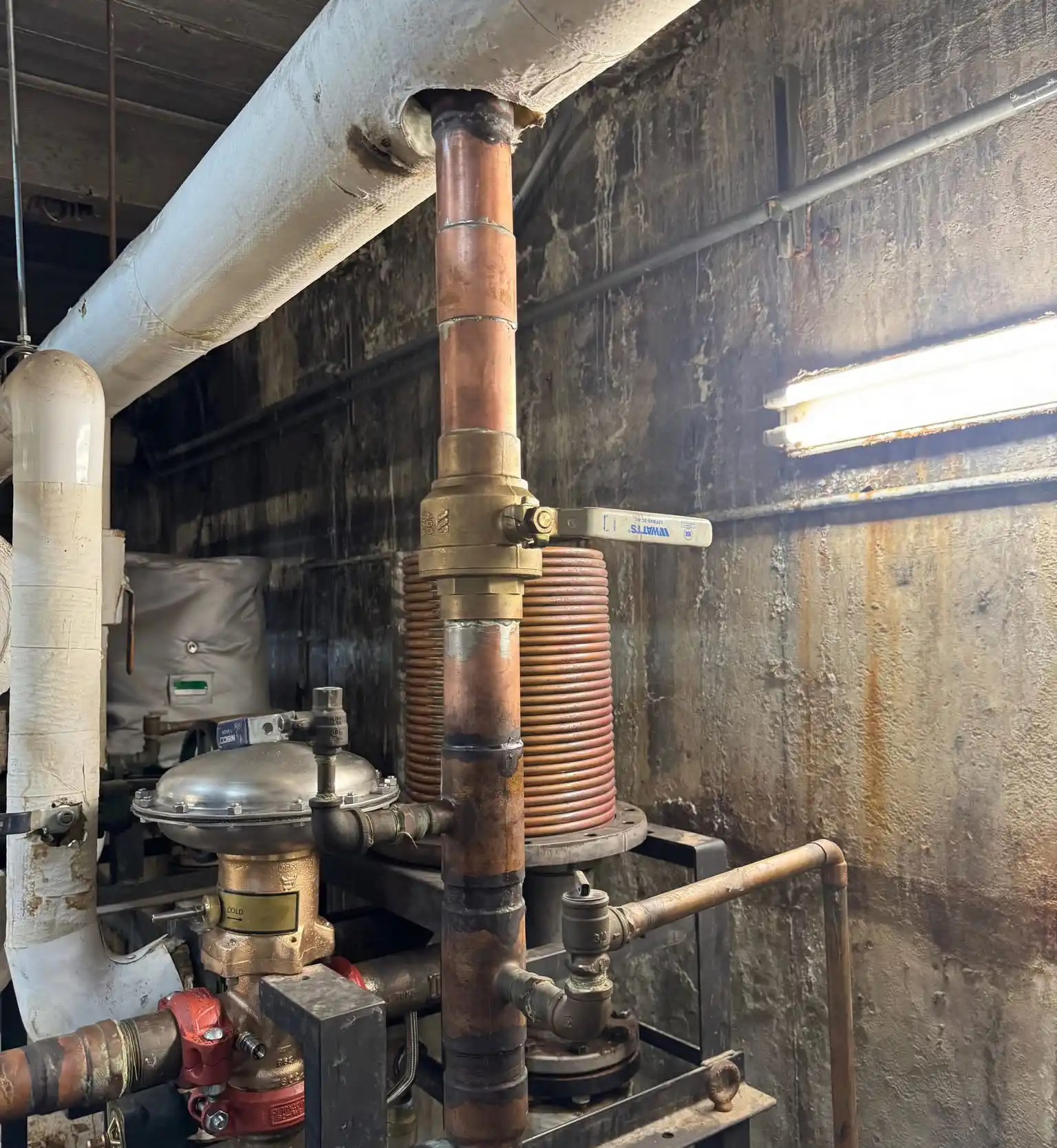 Commercial Heat Exchanger System Commercial heat exchanger and pressure control assembly in a mechanical room