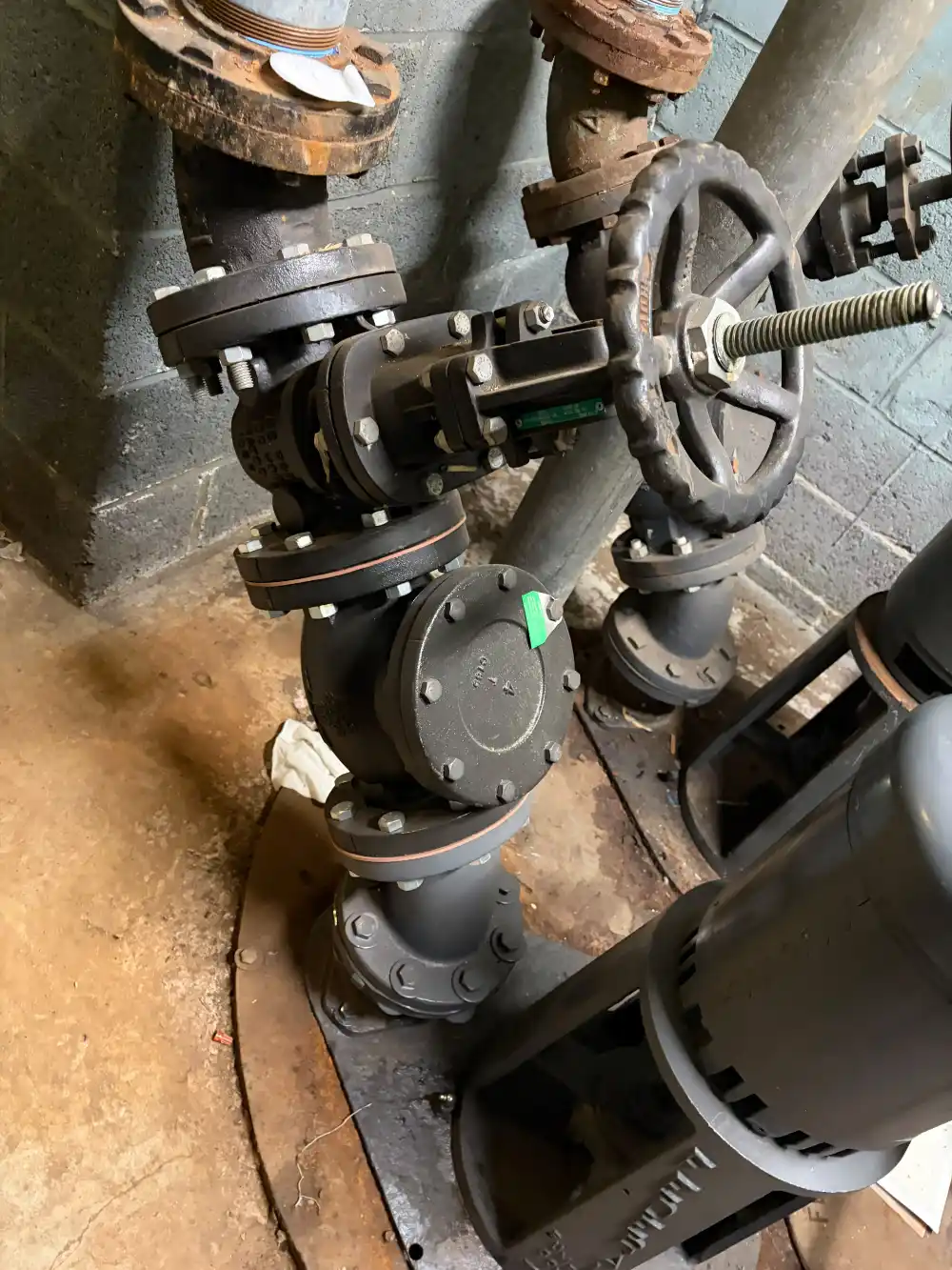 Commercial Pump Isolation Valve Commercial pump system isolation valve and piping assembly in NYC mechanical room
